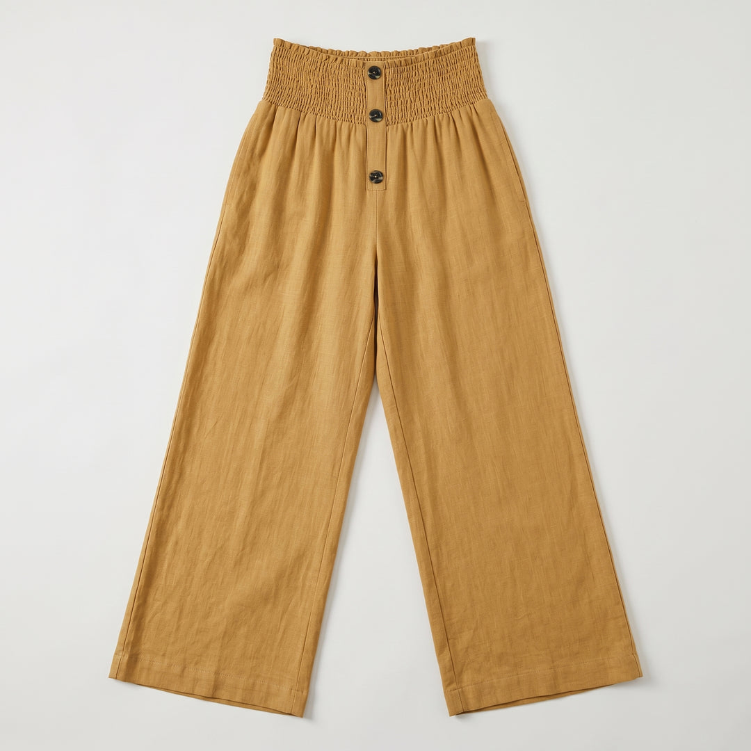Palazzo-Hose in Senfgelb mit Smockbund und Knöpfen, Flat-Lay