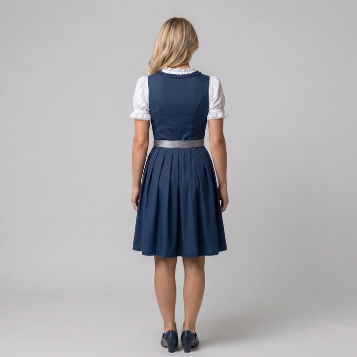 Dirndl Damen dunkelblau Rückansicht, weiße Puffärmel-Bluse, A-Linie Midi