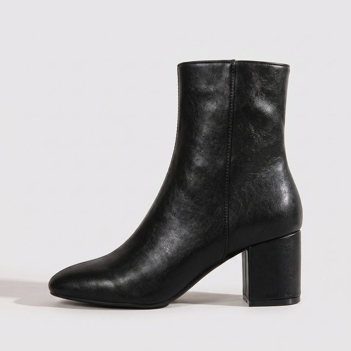 Schwarze Stiefelette mit Blockabsatz und seitlichem Reißverschluss – Seitenansicht