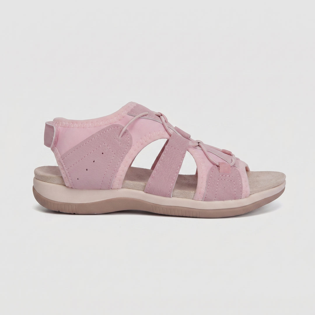 Orthopädische Sandale in Pastellrosa, Seitenansicht mit Klettverschluss