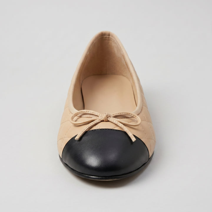 Ballerina Apricot-Schwarz schwarze Kappe Schleife Frontansicht