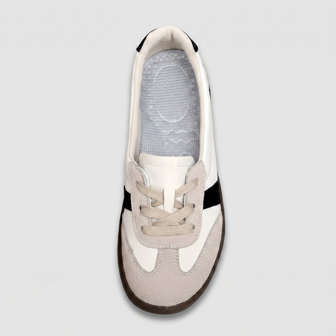 Damen-Sneaker Draufsicht, helle strukturierte Innensohle, beige Schnürsenkel
