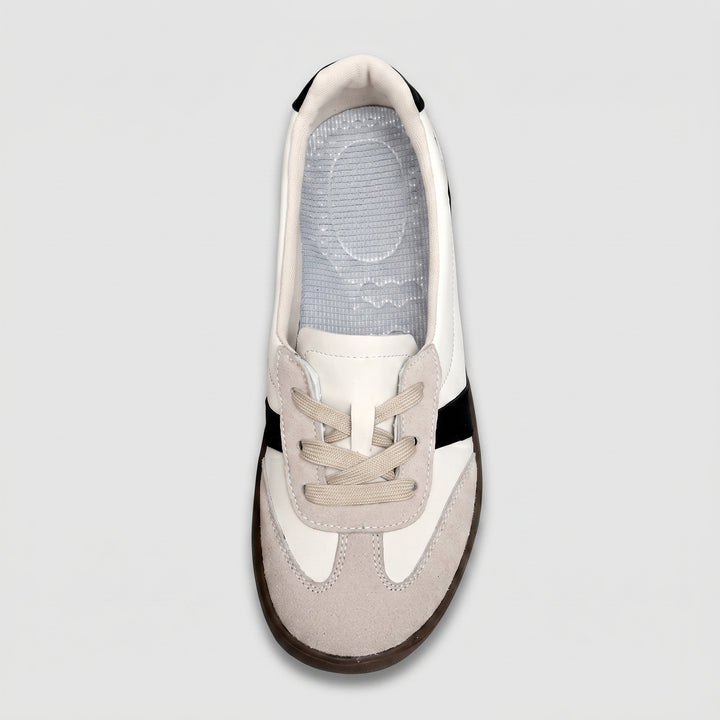 Damen-Sneaker Draufsicht, helle strukturierte Innensohle, beige Schnürsenkel