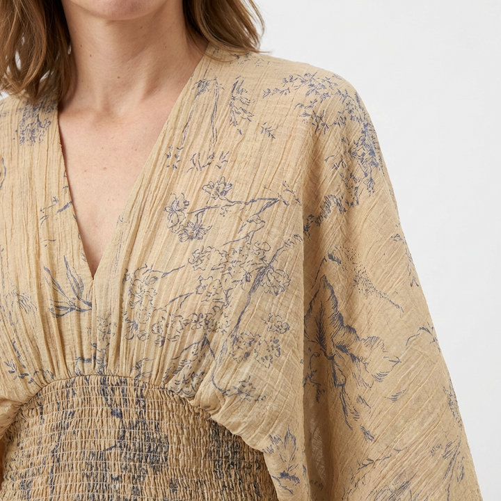 Damen-Bluse mit floralem Print und weiten Batwing-Ärmeln, Rückenansicht