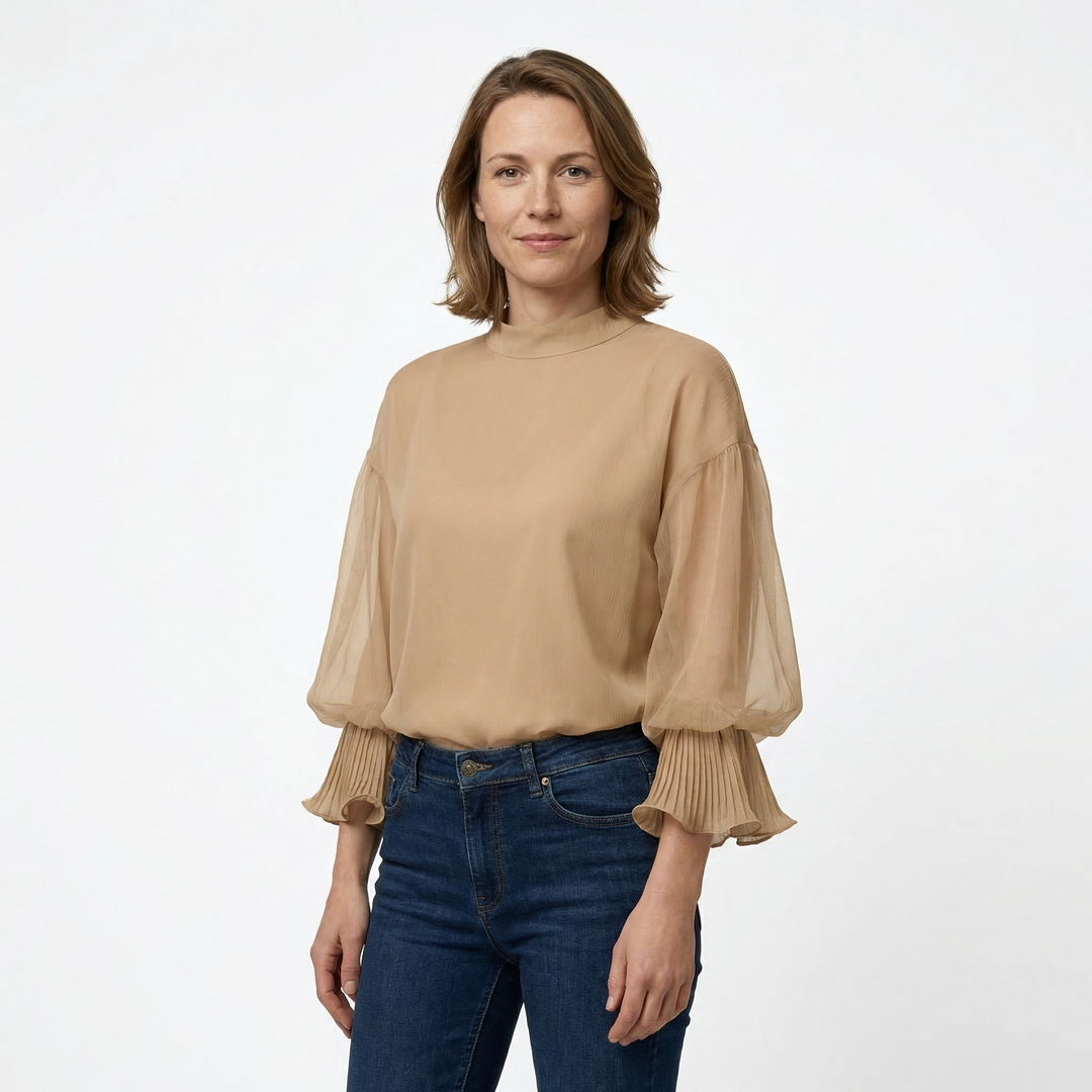Nahaufnahme Rüschendetail Chiffon-Bluse Beige