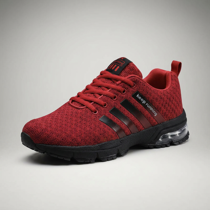 Roter Sneaker mit schwarzer Sohle, Dreiviertelansicht