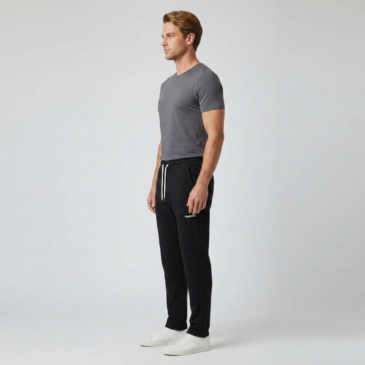 Freizeithose Herren schwarz, Seitenansicht schmal zulaufendes Bein