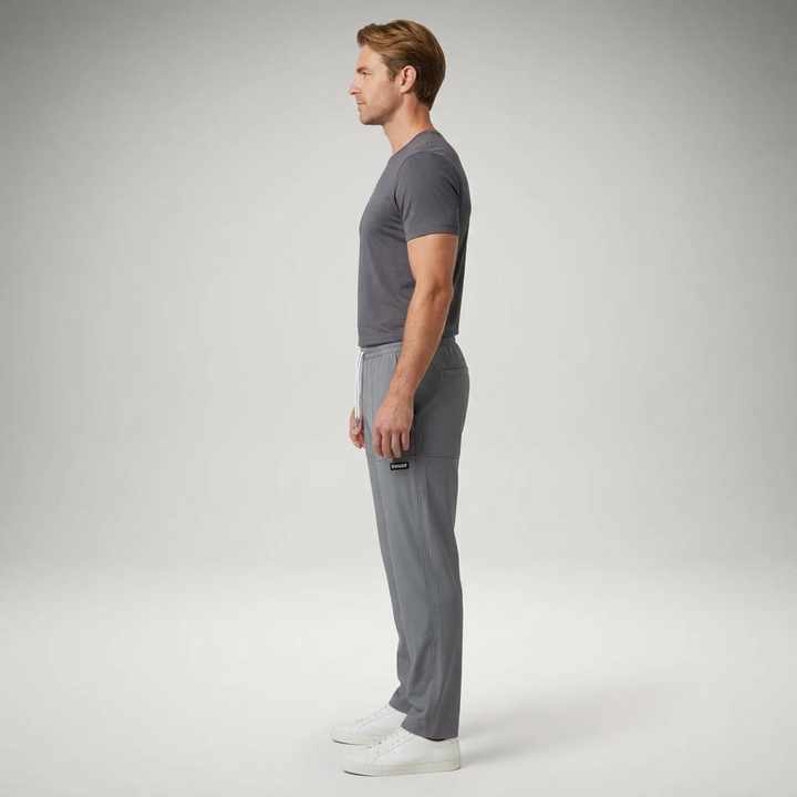 Freizeithose Herren dunkelgrau, Seitenansicht schmal zulaufendes Bein