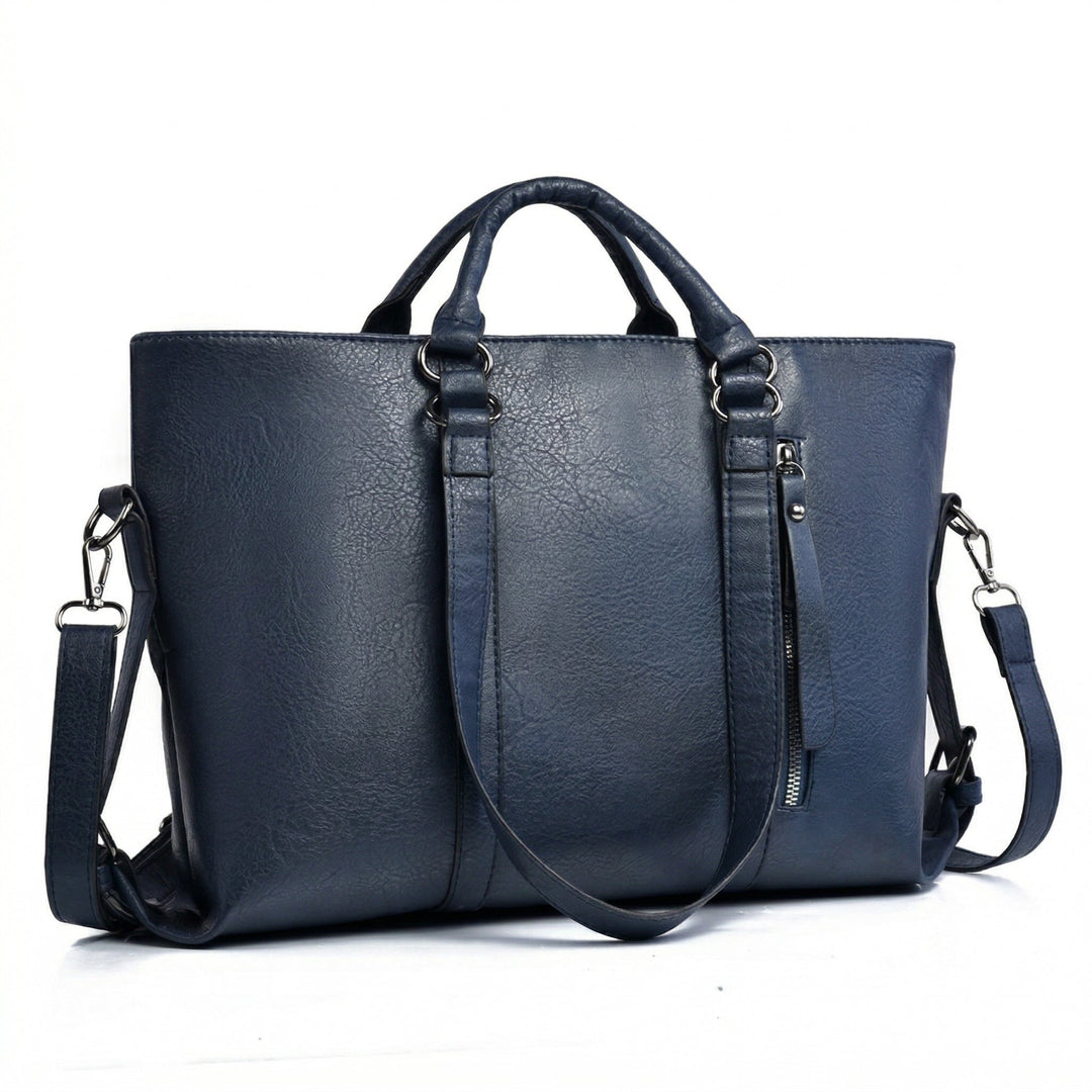 Große Schultertasche Dunkelblau Frontansicht, silberfarbene Hardware, Schulterriemen