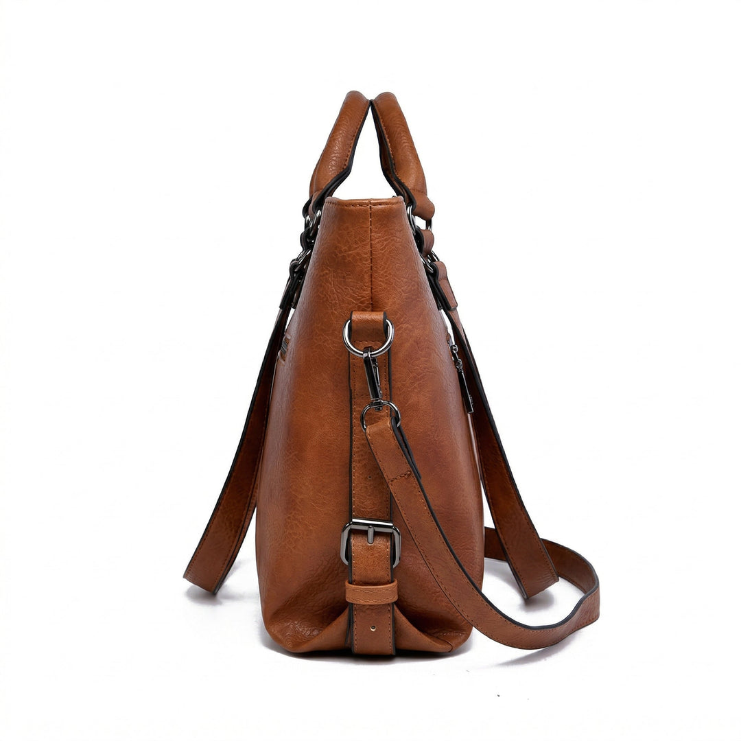 Schultertasche Cognac Seitenansicht, verstellbarer Riemen mit Schnalle sichtbar