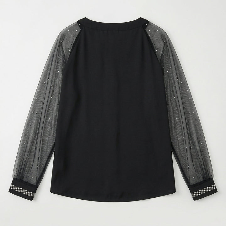 Schwarzes Mesh-Top mit Strass-Ärmeln, Rückseite Flat-Lay