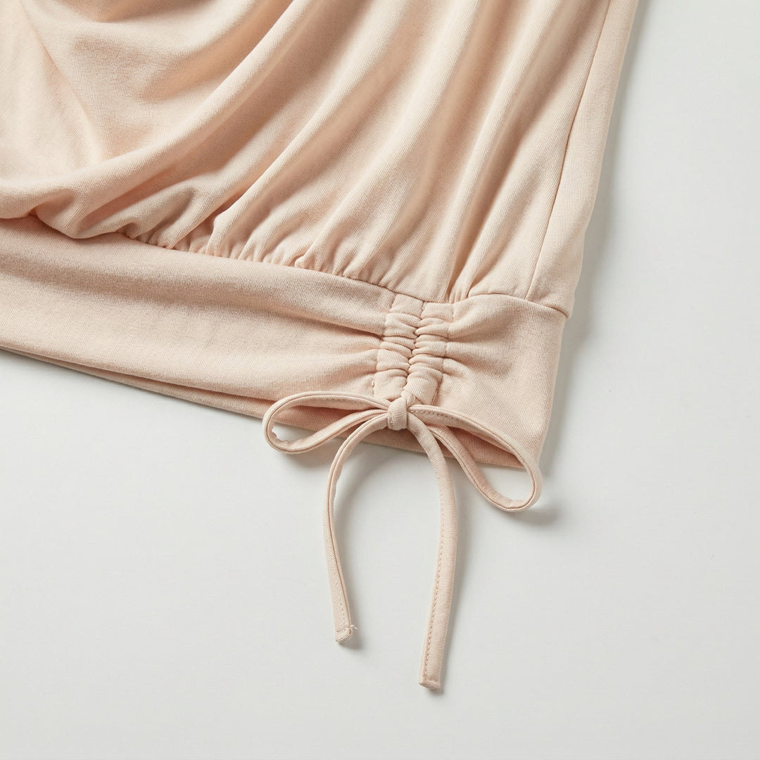 Nahaufnahme seitlicher Raffsaum mit Schleifenband, Beige